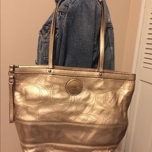 Beautiful Gold Coach purse in perfect condition!!
